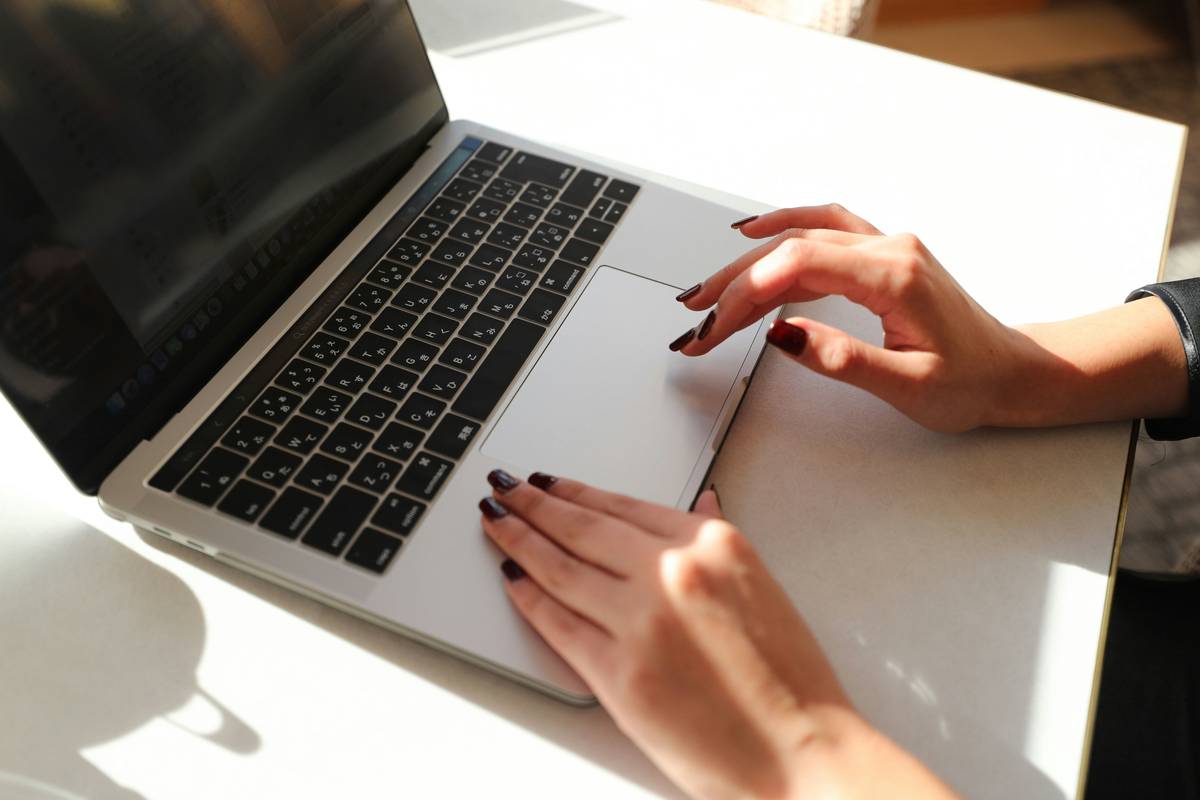 Reputation Management: Person reviewing credit report after telecom data breach