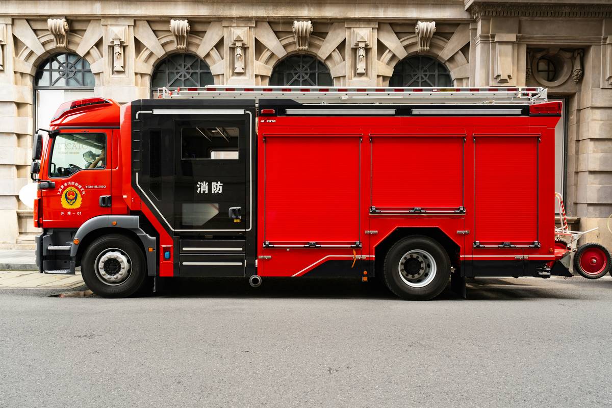 Red fire truck parked on a city street